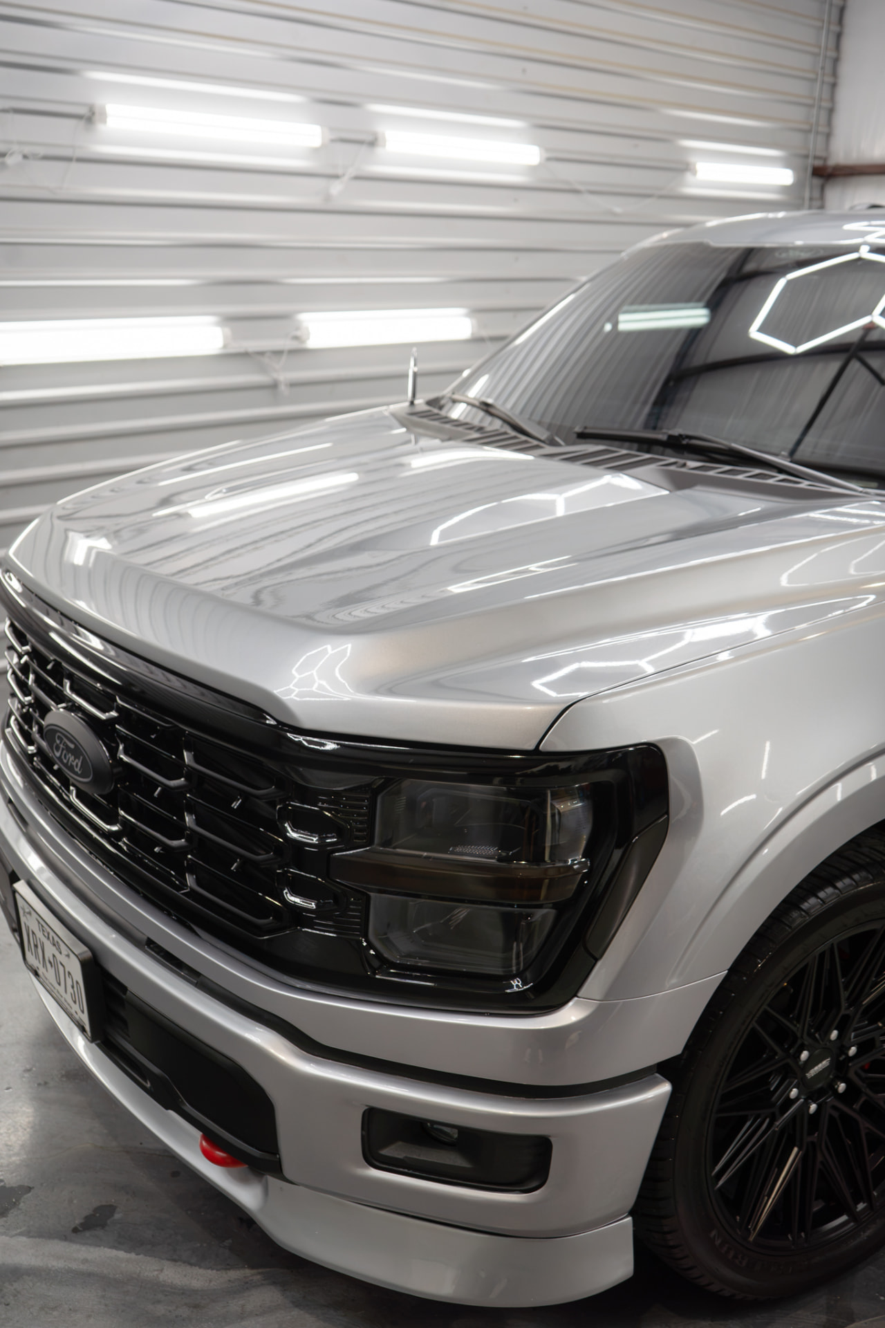 Refined paint reflections after machine polishing at JJ’s Car Care in Terrell